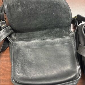 Lot of THREE VINTAGE COACH purses.